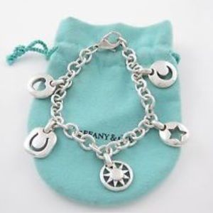 AUTHENTIC TIFFANY & CO RARE SILVER CHARM BRACELET.